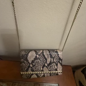 Brown and beige new look clutch bag