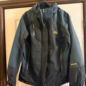 Teal and black outdoor sport ski jacket