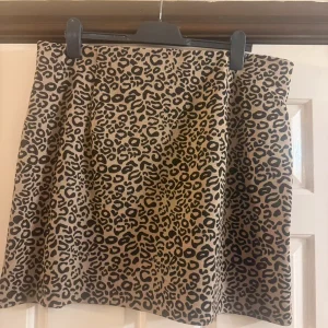 Beige and black Marks & Spencer skirt