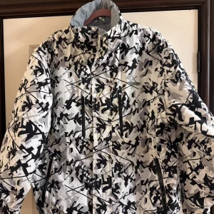 Multi coloured trespass ski jacket