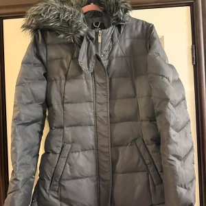 Light khaki greyish colour next coat